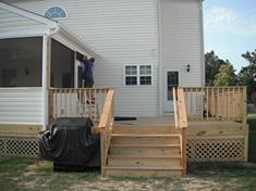 Custom built Sunroom and deck by Compton Contracting